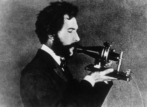 Alexander Graham Bell with telephone, 1876
